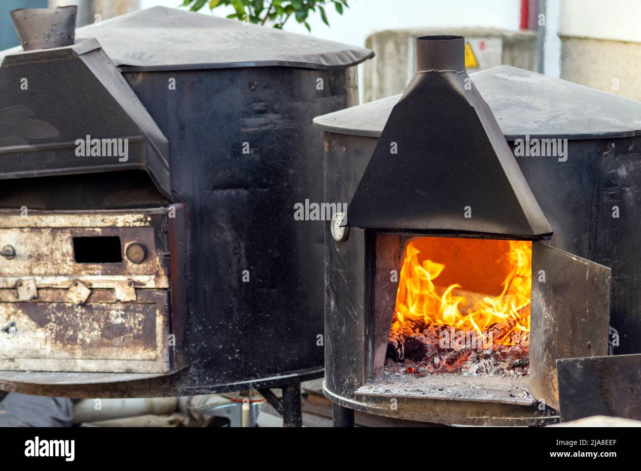 Fuoco cucina all'aperto per le strade, eventi sociali e popolari. Foto Stock