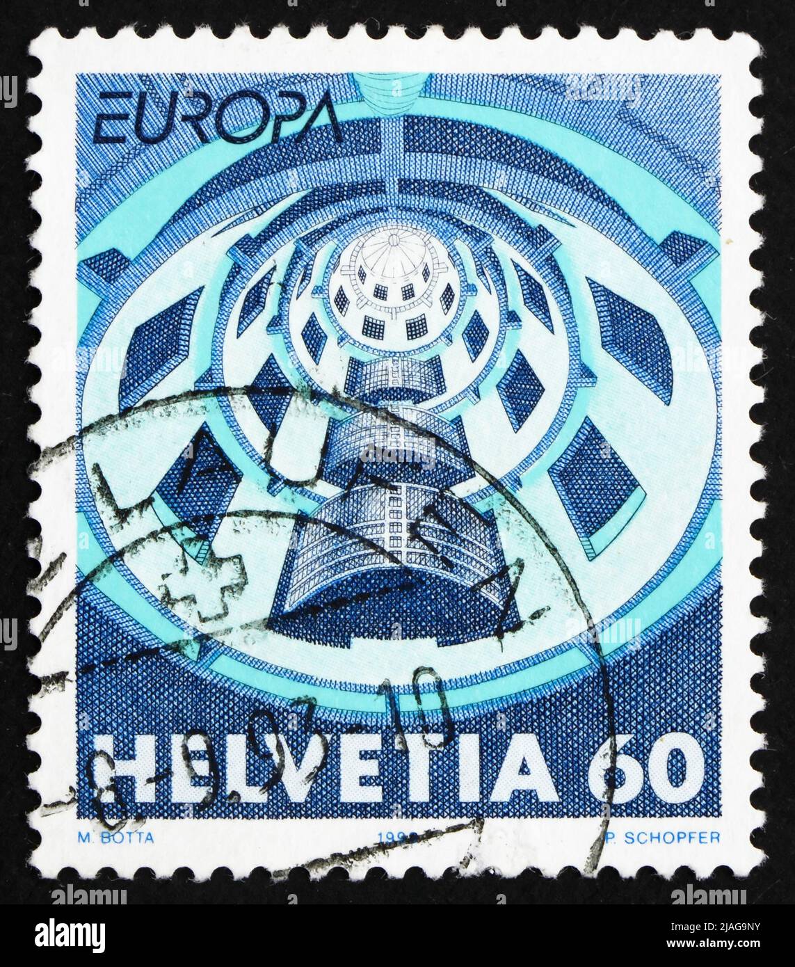 SVIZZERA - CIRCA 1993: Un francobollo stampato in Svizzera mostra Media House, Villeurbanne, Francia, circa 1993 Foto Stock