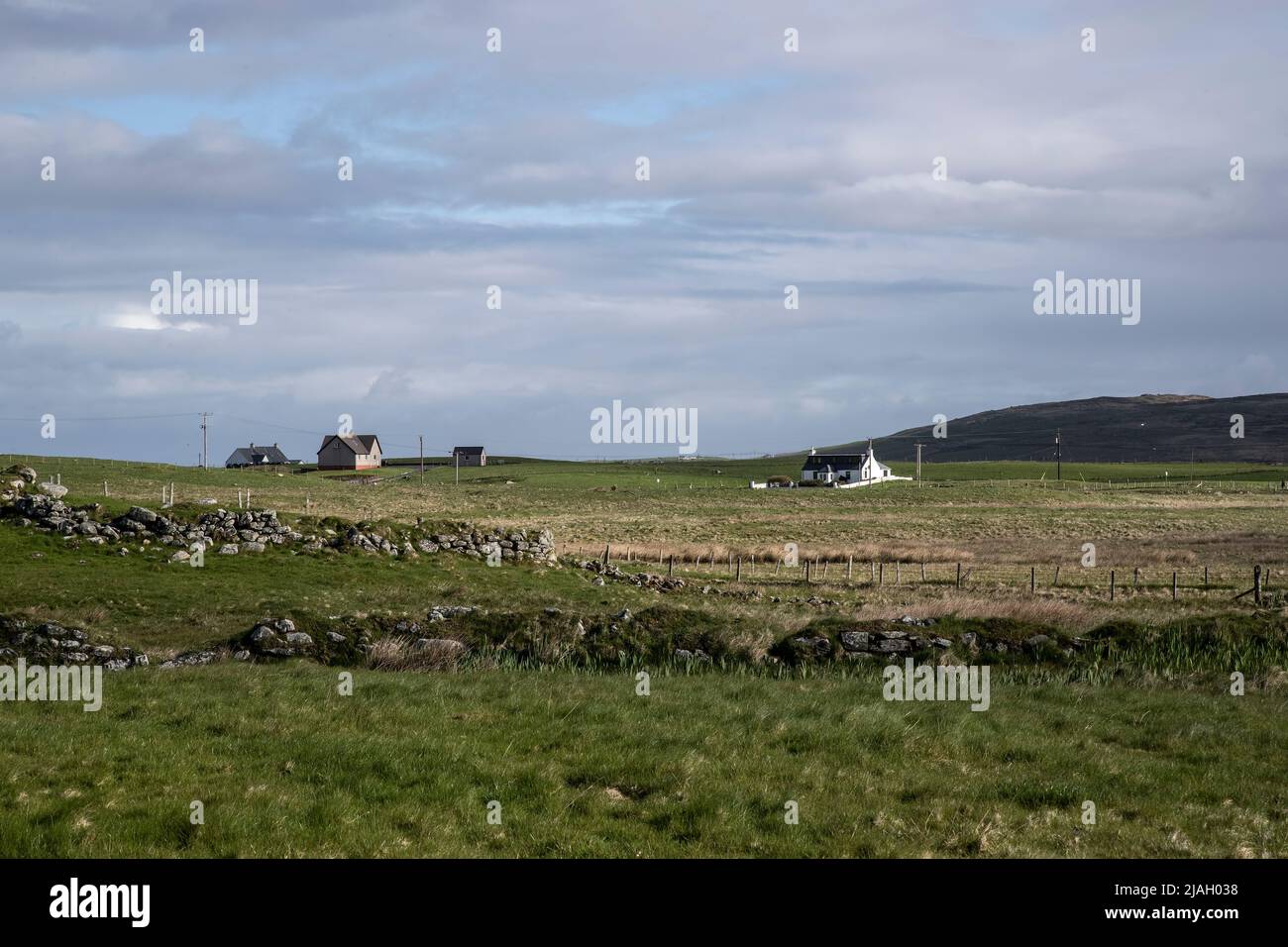 Case isolate a Balranald in Nord Uist, Ebridi esterne situato su paludi selvatiche e fauna ricca prateria una posizione tranquilla e remota Foto Stock