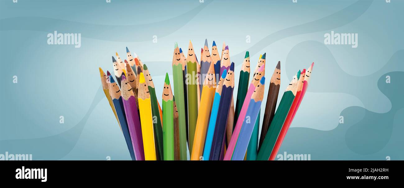 Concetto di inclusione e uguaglianza in materia di diversità. Gruppo di matite sorridenti che rappresentano uomini e donne di diversa cultura. Concetto di persone multietniche Foto Stock