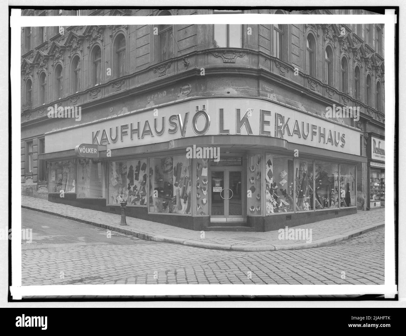 Attività commerciali: 'Kaufhaus Völker', 18th, Vinzenzgasse/Währinger Straße Foto Stock