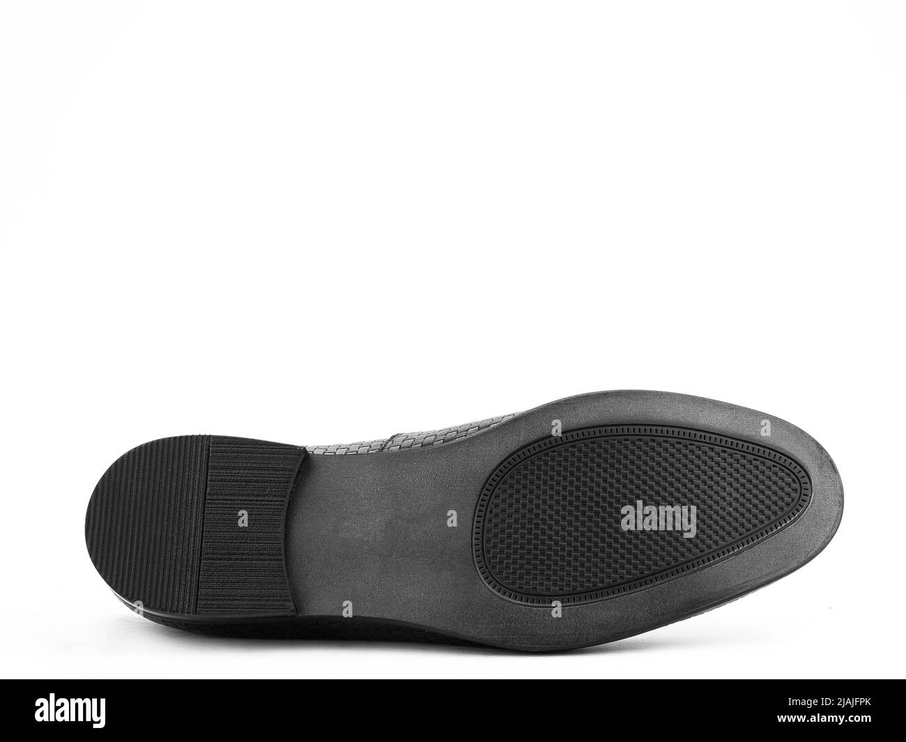 Suola per scarpe, vista dal basso. Primo piano della suola della scarpa isolata su sfondo bianco. Posiziona per il testo. Elemento di stivali. Concetto di produzione di accessori per calzature Foto Stock