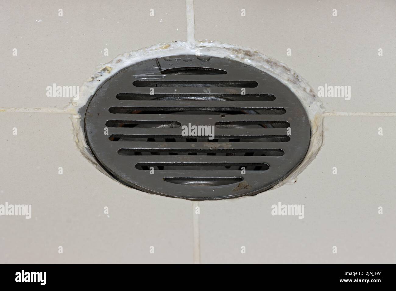 Una griglia sul foro di scarico, primo piano Foto Stock