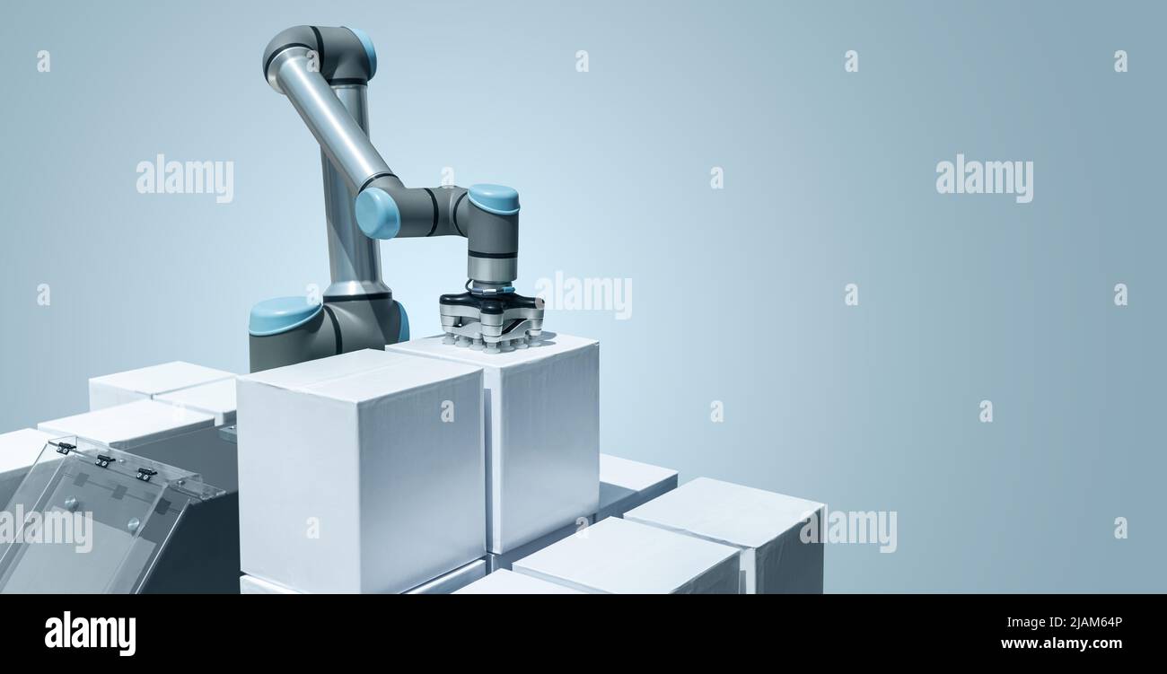 Braccio robot con scatole su sfondo grigio. Concetto Smart Industry 4,0 Foto Stock