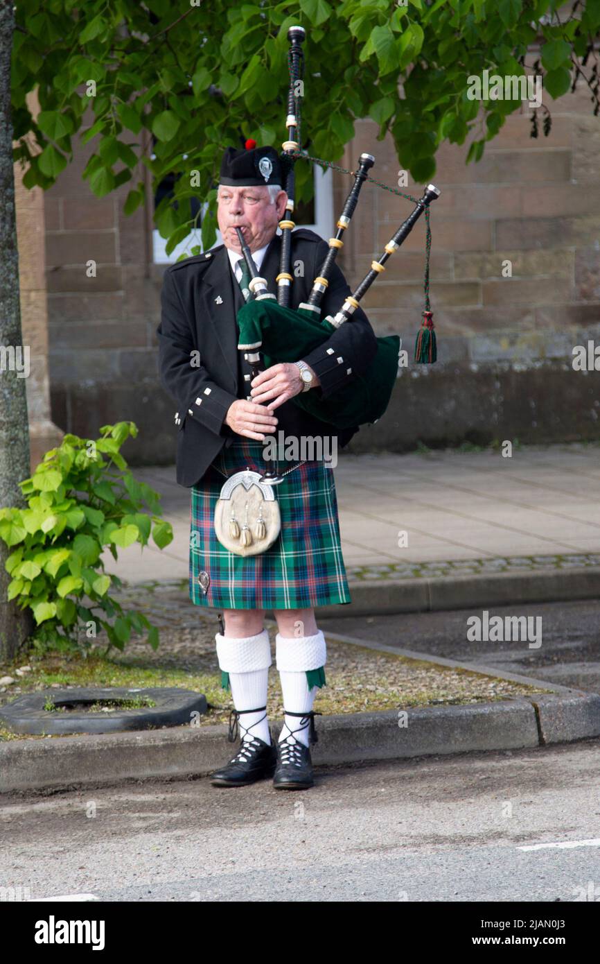 Scottish Piper, Dornoch, Sutherland, Scozia Foto Stock