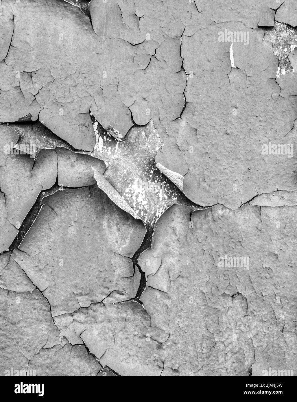 Vecchia vernice incrinata sulla parete di calcestruzzo. Sbucciatura della vernice sulla struttura della parete. Motivo di rustico blu grunge materiale Foto Stock