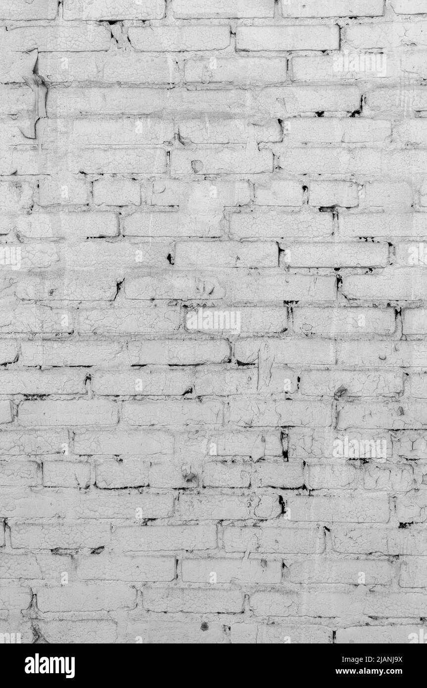 Astratto texture tempo colorato vecchio stucco grigio chiaro e vernice invecchiata bianco mattone sfondo parete in ambiente rurale, grungy arrugginito blocchi di pietra Foto Stock