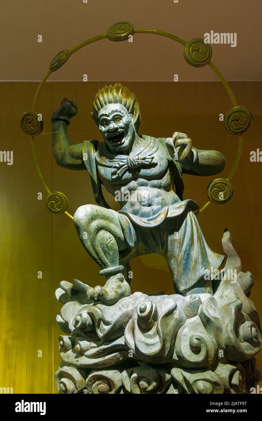 Thunder God in mostra nel Tempio relico del dente di Buddha e Museo, Repubblica di Singapore. Foto Stock