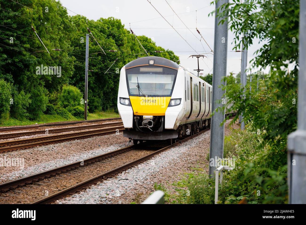Thameslink Siemens Desiro Classe 700 treno elettrico sulla linea principale della costa orientale a Offord Cluny, Cambridgeshire, Inghilterra Foto Stock