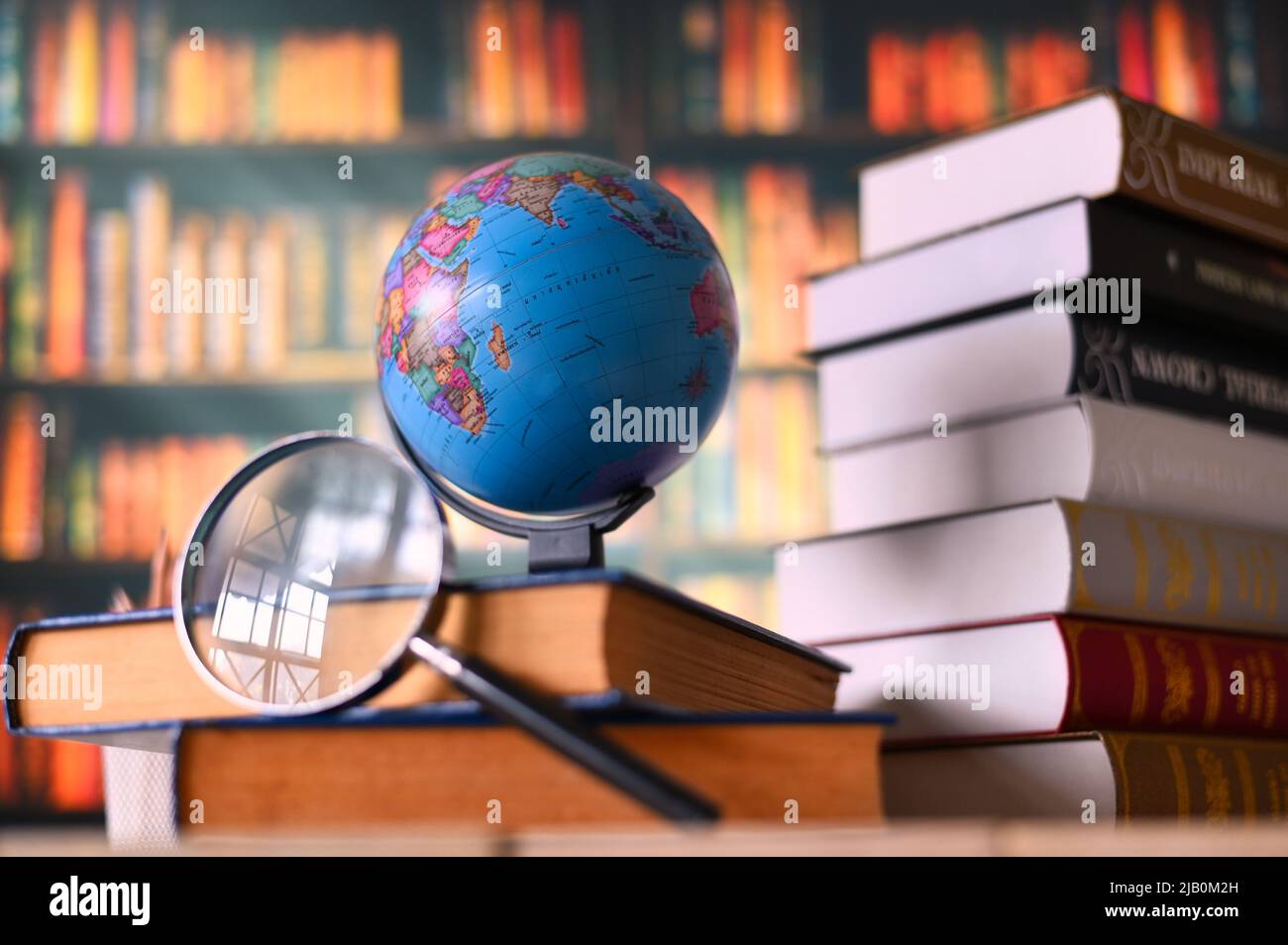 Mondo sul libro. Concetto di scuola di istruzione Foto Stock