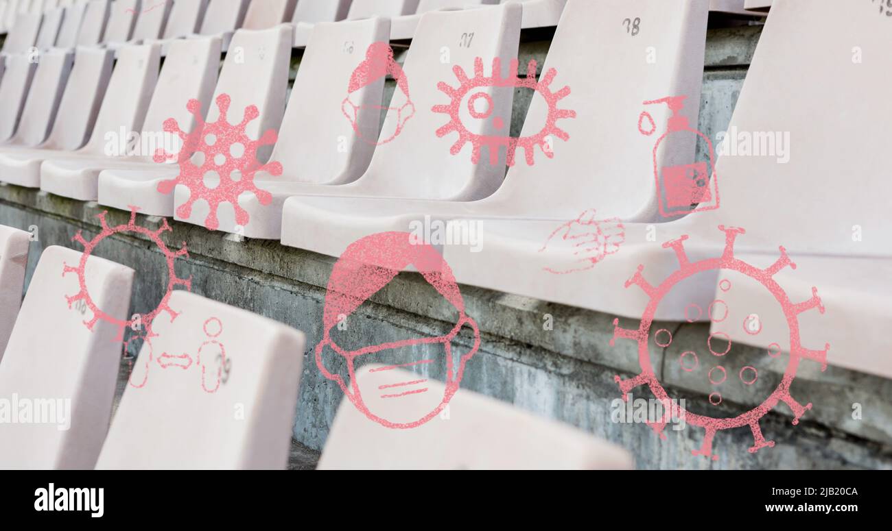 Coronavirus Concept icone contro posti vuoti nello stadio sportivo Foto Stock
