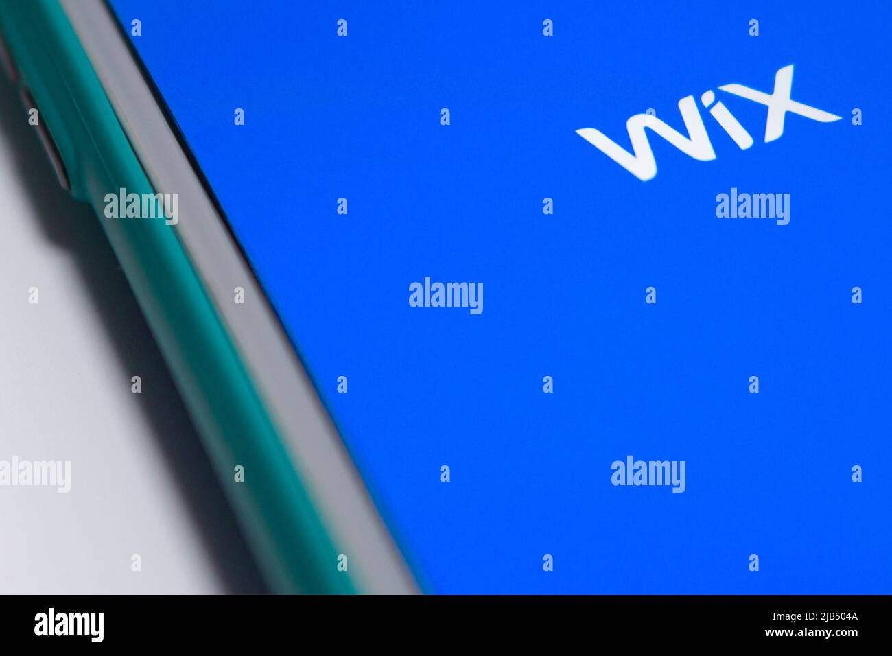 Logo WiX su iOS. WiX è un'azienda israeliana che fornisce servizi Web basati su cloud che consente agli utenti di creare siti html e mobili con strumenti di trascinamento Foto Stock