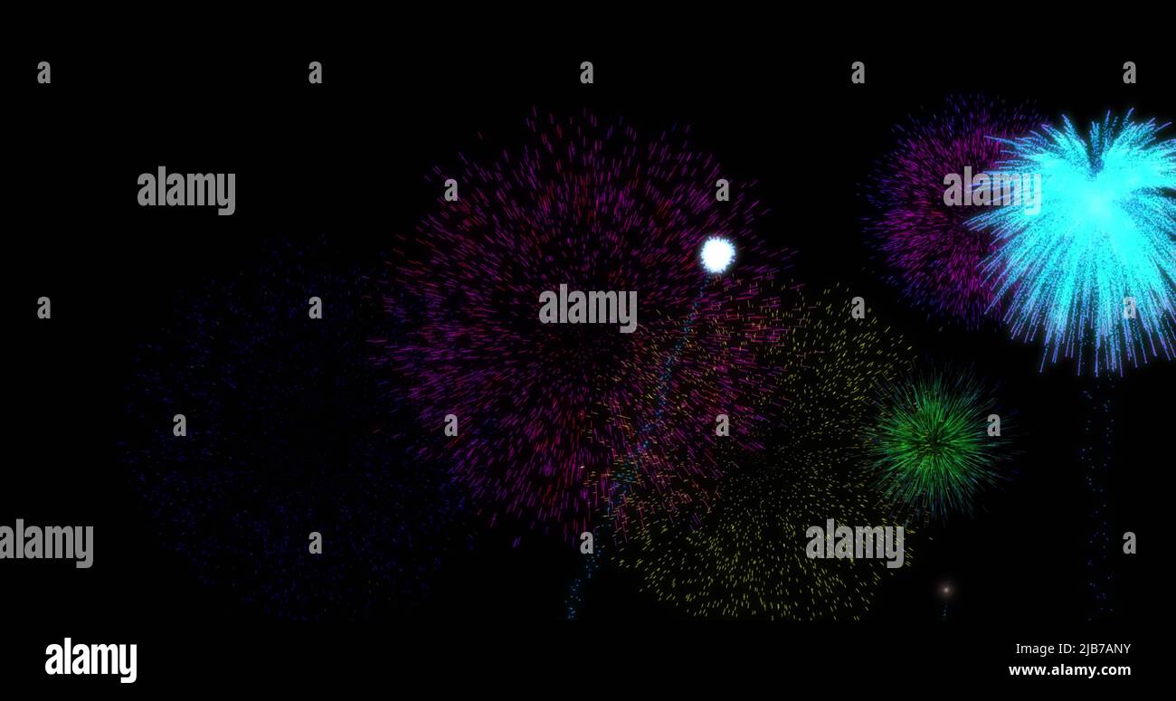 Immagine di colorati fuochi d'artificio di natale e Capodanno esplodendo nel cielo notturno Foto Stock