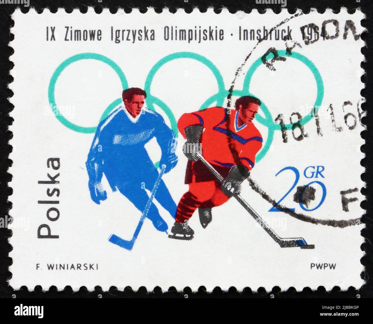POLONIA - CIRCA 1964: Un francobollo stampato in Polonia mostra Hockey su ghiaccio, sport olimpici invernali, Innsbruck 64, circa 1964 Foto Stock