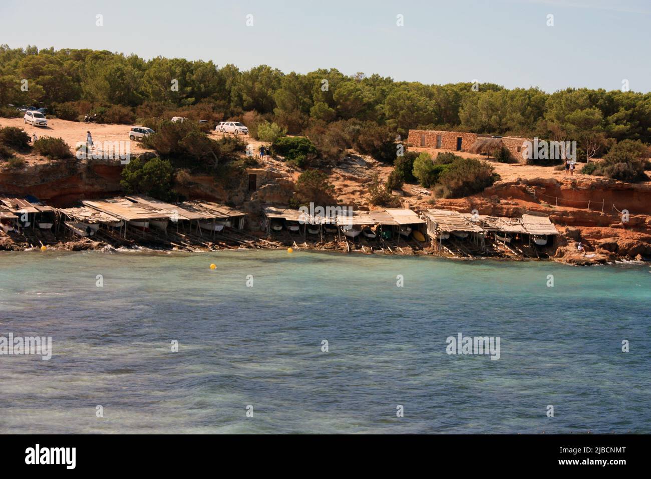 Destinazione turistica estiva per eccellenza le isole Baleari e il loro mare turchese a ibiza Foto Stock