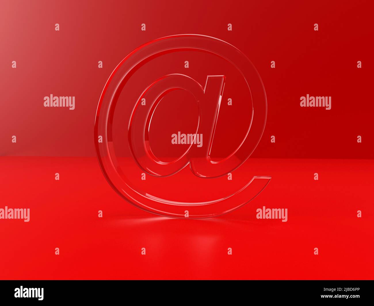 simbolo at per l'indirizzo e-mail come rendering in gel 3d in ambiente di colore rosso Foto Stock