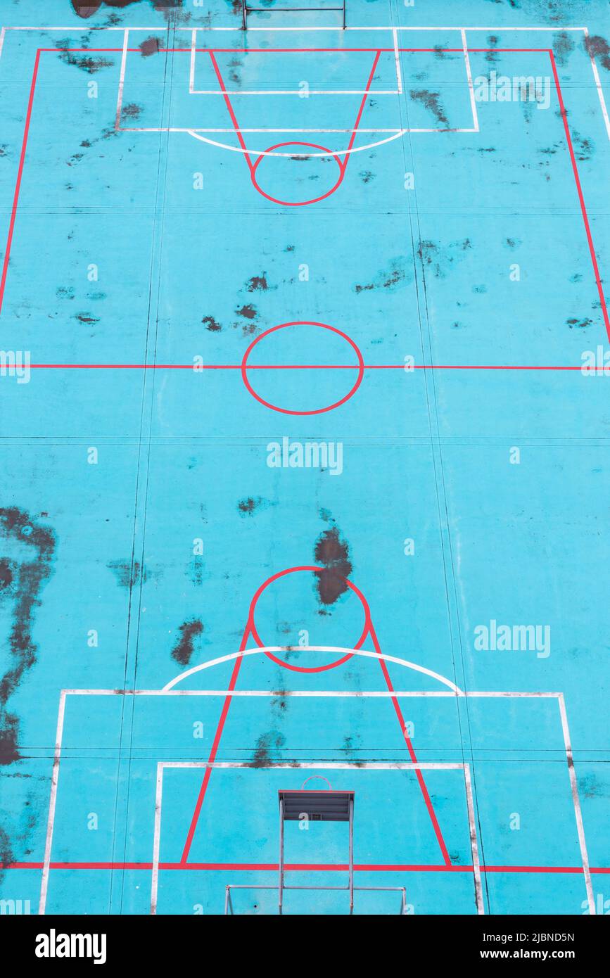 texture del campo da basket blu chiaro, dettagli di linee geometriche disegnate sul terreno, sfondo con figure geometriche, luogo per lo sport Foto Stock