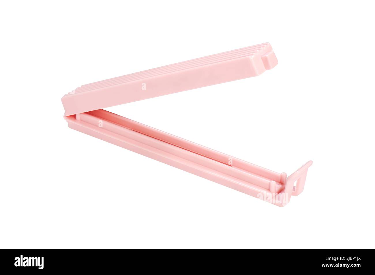 Clip per borsa rosa in plastica su sfondo bianco, impilamento foto Foto Stock