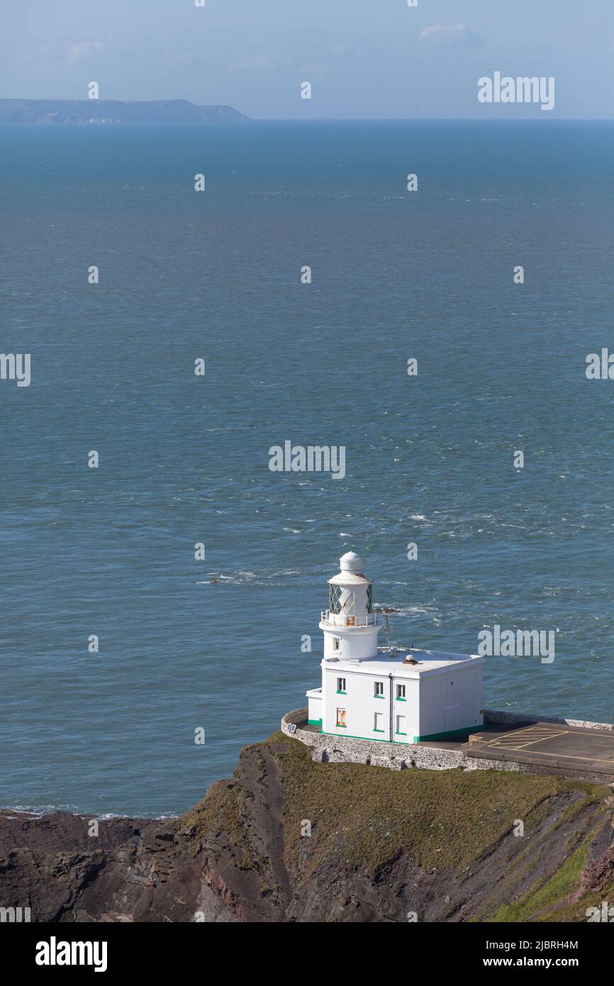 Faro Hartland Point che protegge le navi della costa settentrionale del Devon. Foto Stock