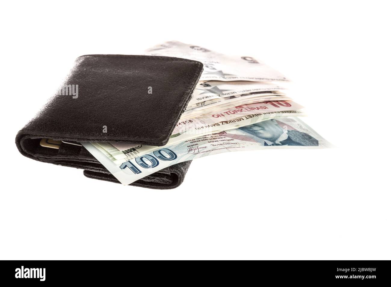 Lira turca in un portafoglio isolato su bianco Foto Stock