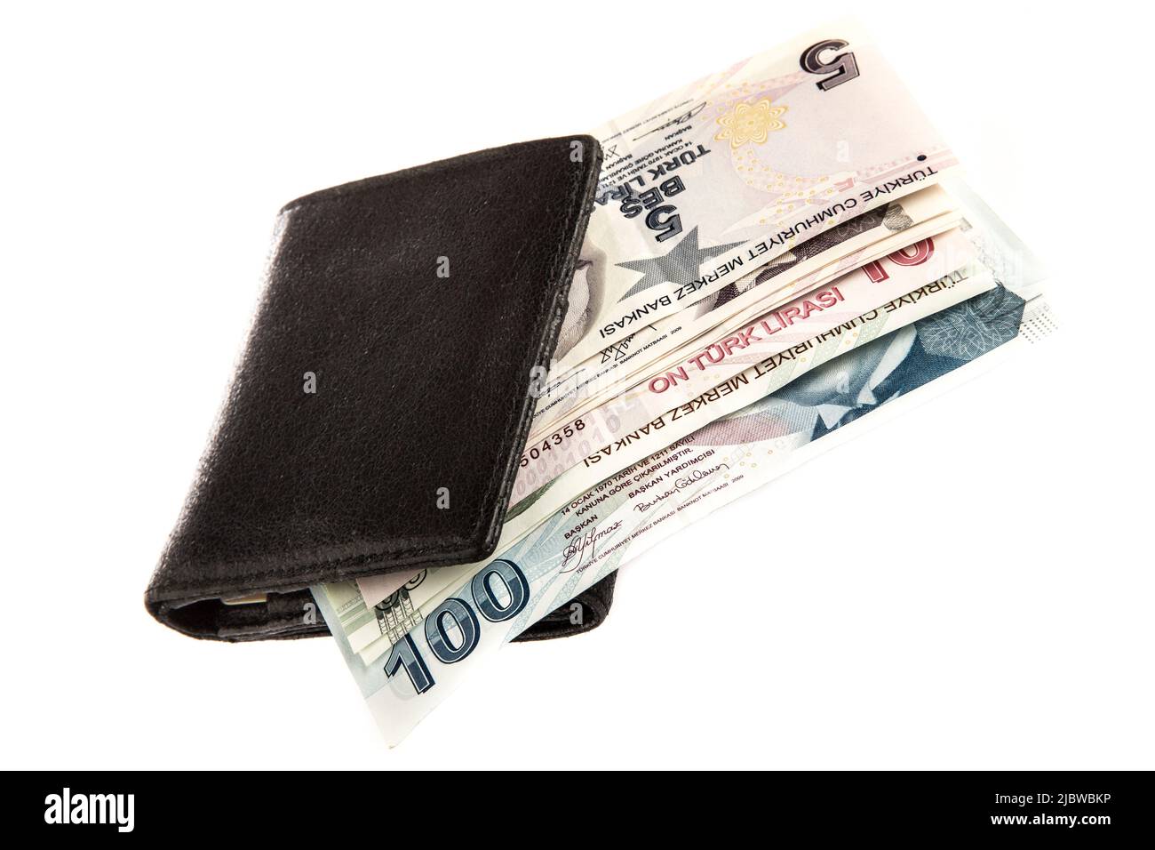 Lira turca in un portafoglio isolato su bianco Foto Stock