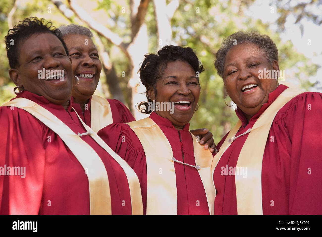 Senior donne africane a cantare in coro Foto Stock