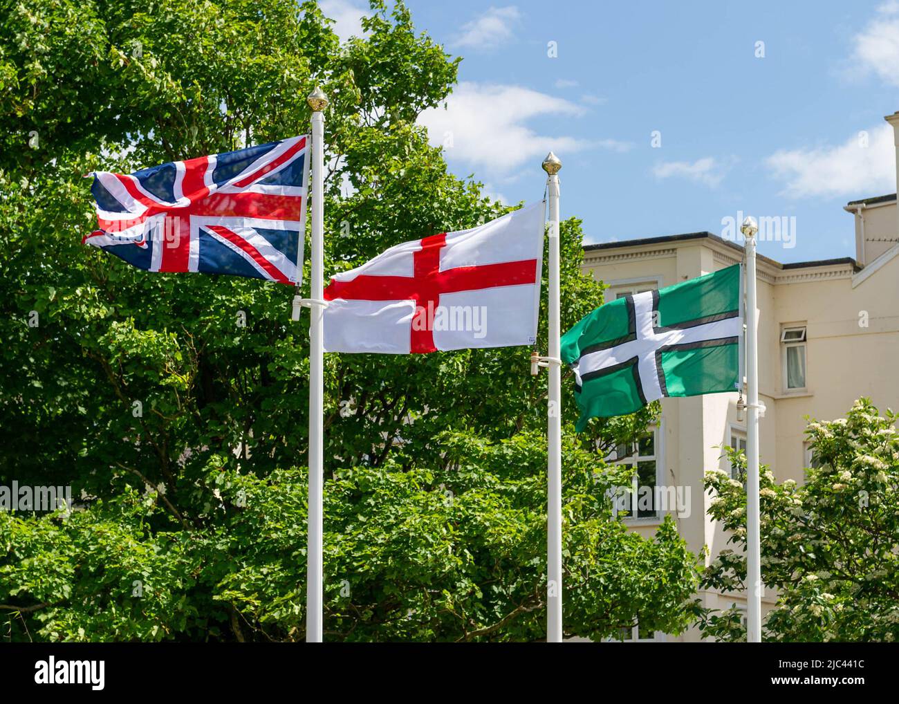 Union Jack, Croce di San Giorgio e la bandiera della Contea di Devon Foto Stock