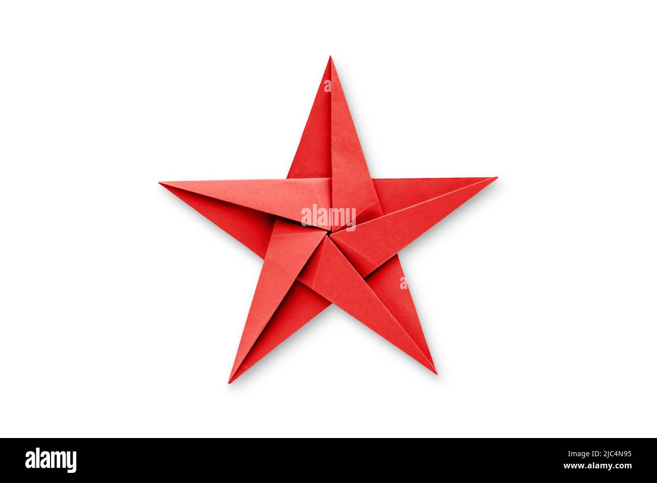 Carta rossa stella origami isolato su uno sfondo bianco vuoto. Foto Stock