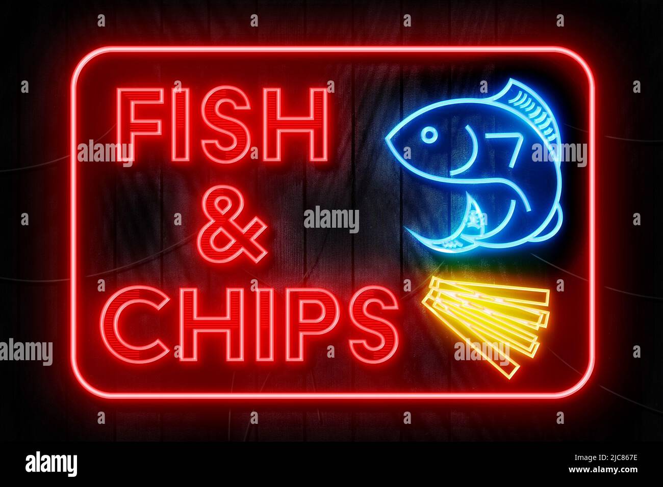 Fish & Chips Neon Sign su un muro di legno scuro Foto Stock