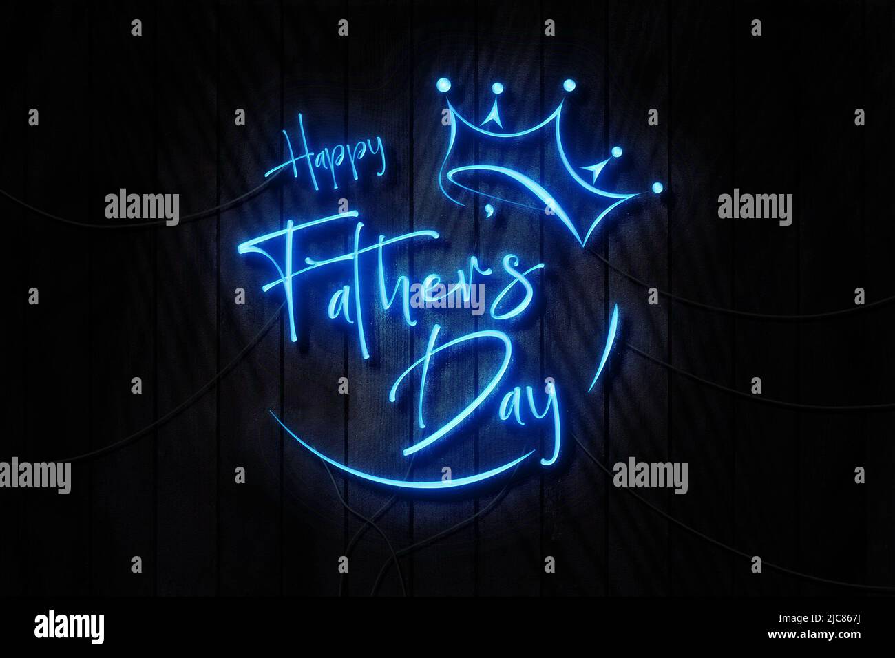 Buon giorno dei Padri Neon segno su un muro di legno scuro Foto Stock