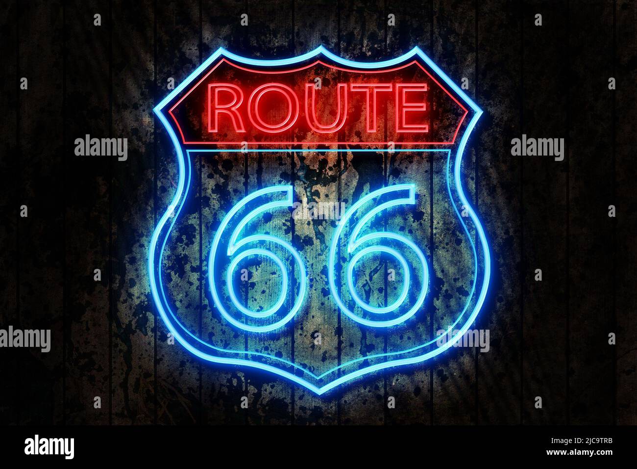 Route 66 Neon Sign su un muro di legno scuro Foto Stock