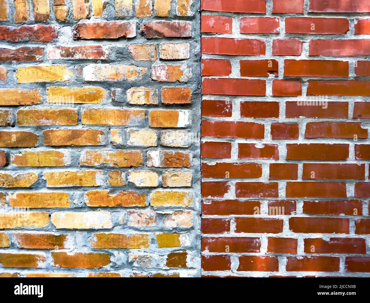 Vecchio muro di mattoni texture, giallo e rosso mattoni motivo come sfondo e elemento grafico di design Foto Stock