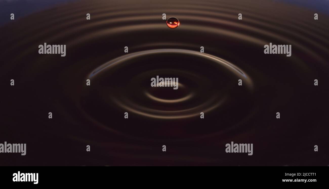 Water drop Fotografia, primo piano di gocce d'acqua rossa in acqua di colore blu scuro. Foto Stock