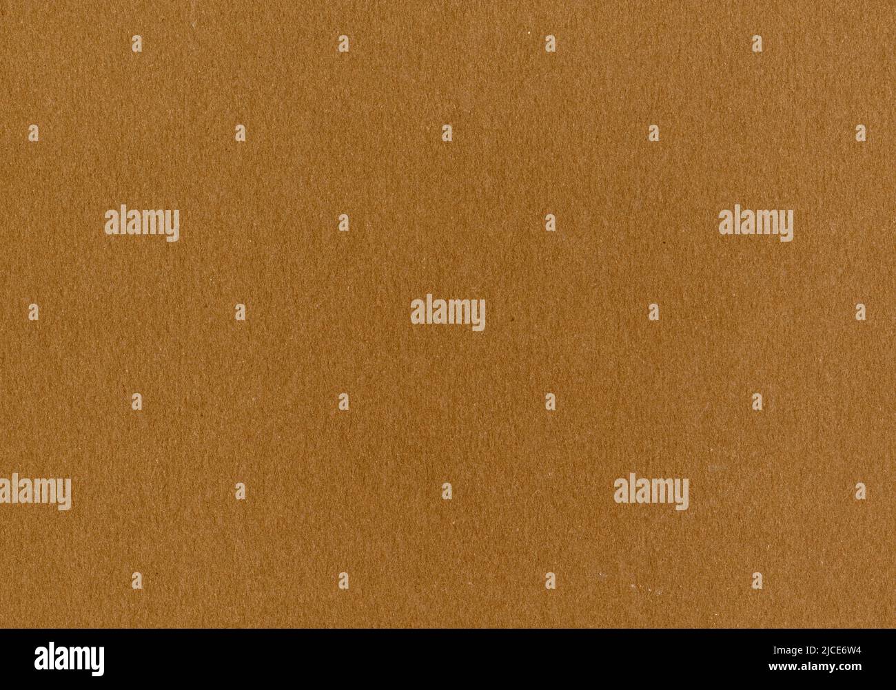 Carta di cartone molto dettagliata tessuto fondo grana fine caramello marrone fibra ondulata liscia non rivestita con spazio di copia per il testo per la materia Foto Stock