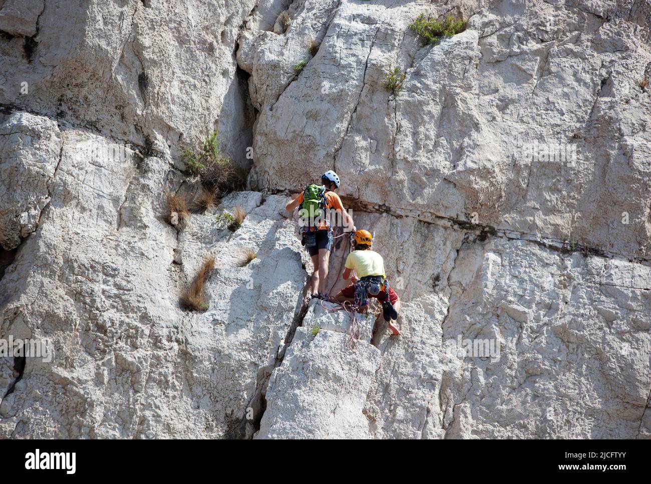 Arrampicatore su un fronte ripido Foto Stock