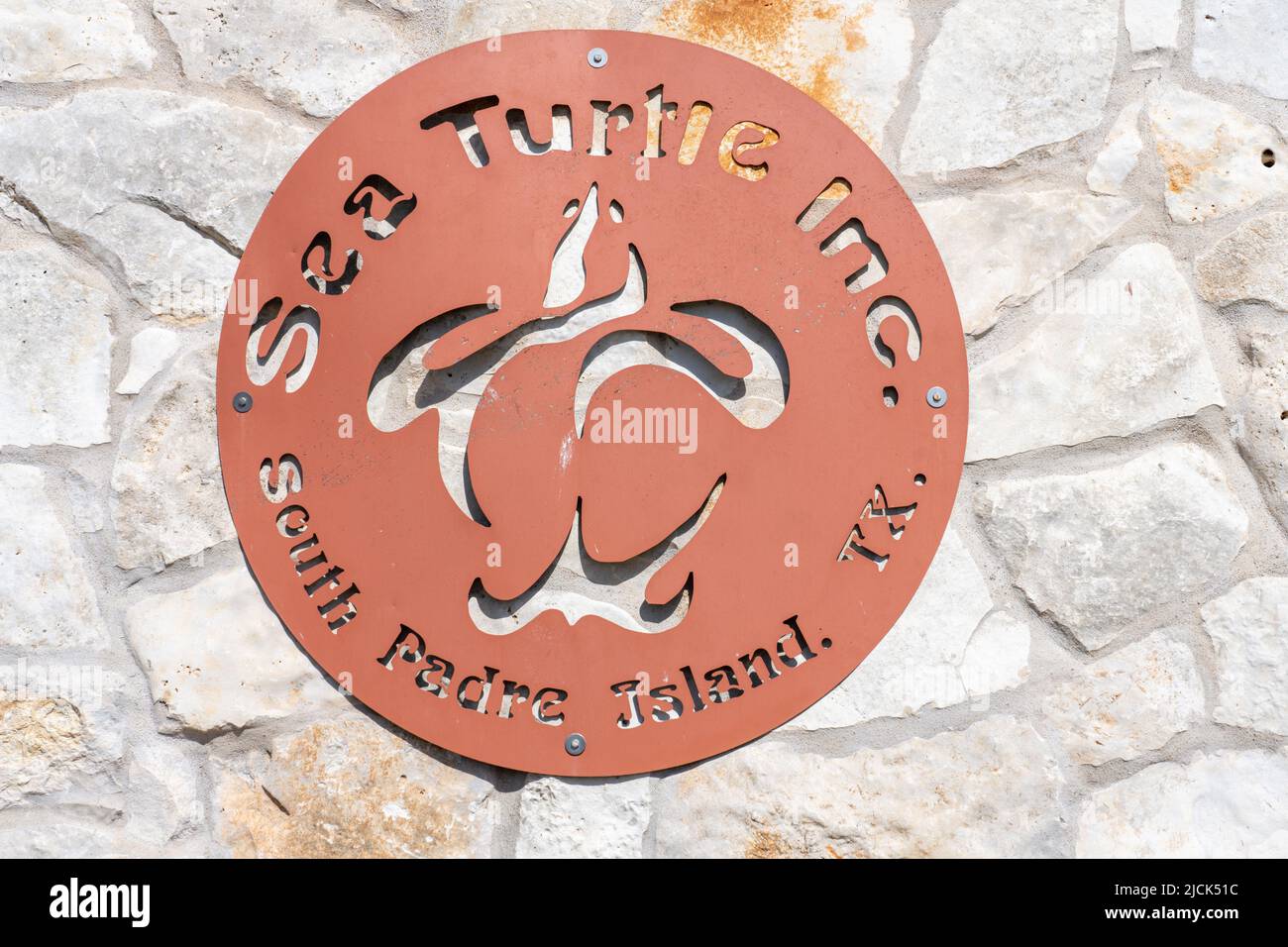 Il cartello con il logo di Sea Turtle Inc., un centro di salvataggio e riabilitazione delle tartarughe marine a South Padre Island, Texas. Foto Stock