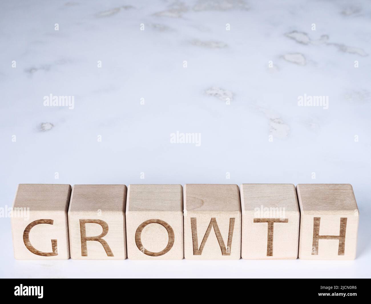 Blocchi di legno con testo scritto come concetto di CRESCITA personale Foto Stock