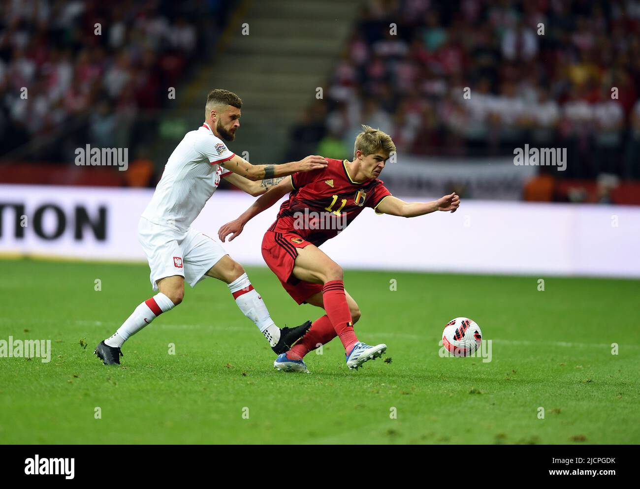 VARSAVIA, POLONIA - 14 GIUGNO 2022: UEFA Nations League 2023 Polonia - Belgio gioco o/p: Mateusz Klich (Polonia) Charles De Ketelaere (Belgio) Foto Stock