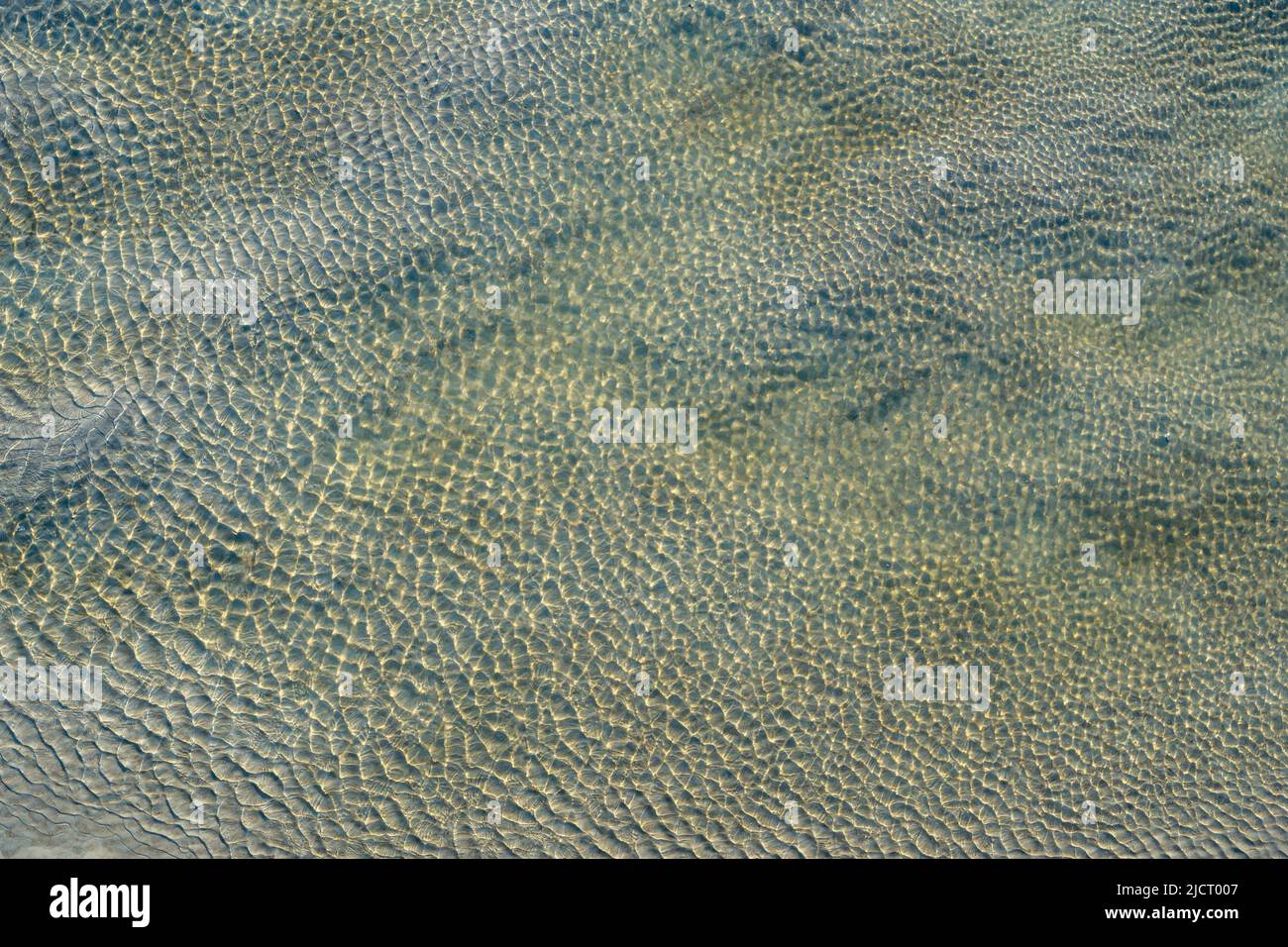 Riflessioni in una piscina di Tidal a Tybee Island, Georgia Foto Stock
