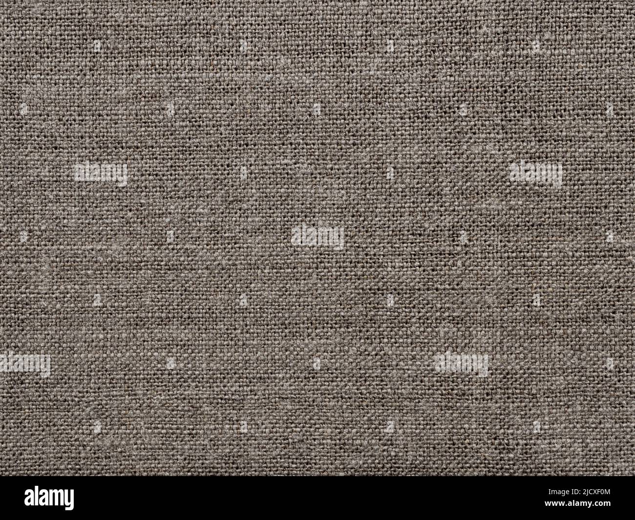 Tessuto di lino marrone texture come sfondo di fili intrecciati Foto Stock