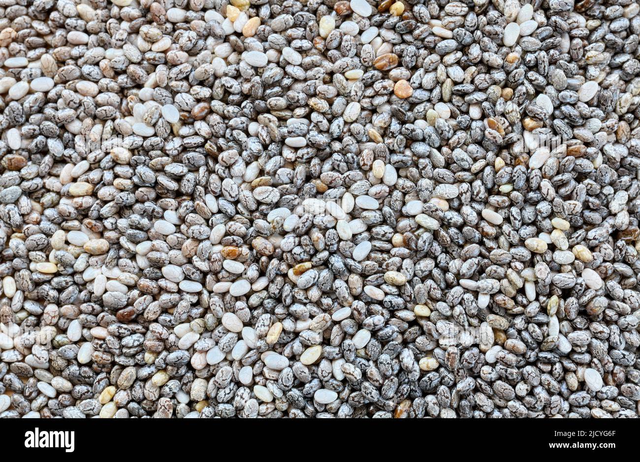 Immagine ravvicinata dei semi di chia, sfondo astratto del cibo Foto Stock