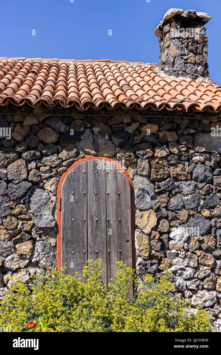 Porta ad arco presso l'hotel rurale, Caserio Los Partidos, El Tanque, vicino Santiago del Teide a Tenerife, Isole Canarie, Spagna Foto Stock