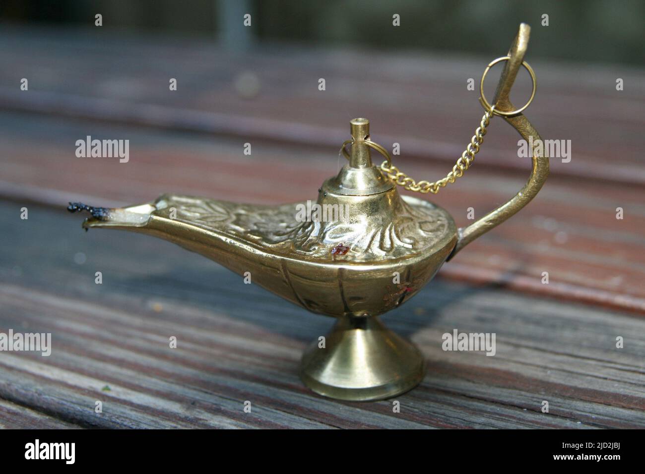 Lampada ad olio sul tavolo con stoppino, Pretoria National Botanical Garden, Pretoria/Tshwane, Gauteng, Sudafrica. Foto Stock