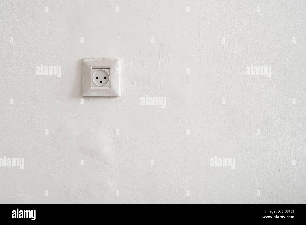 Sosket bianco a tre buche nel buco bianco in Israele Foto Stock