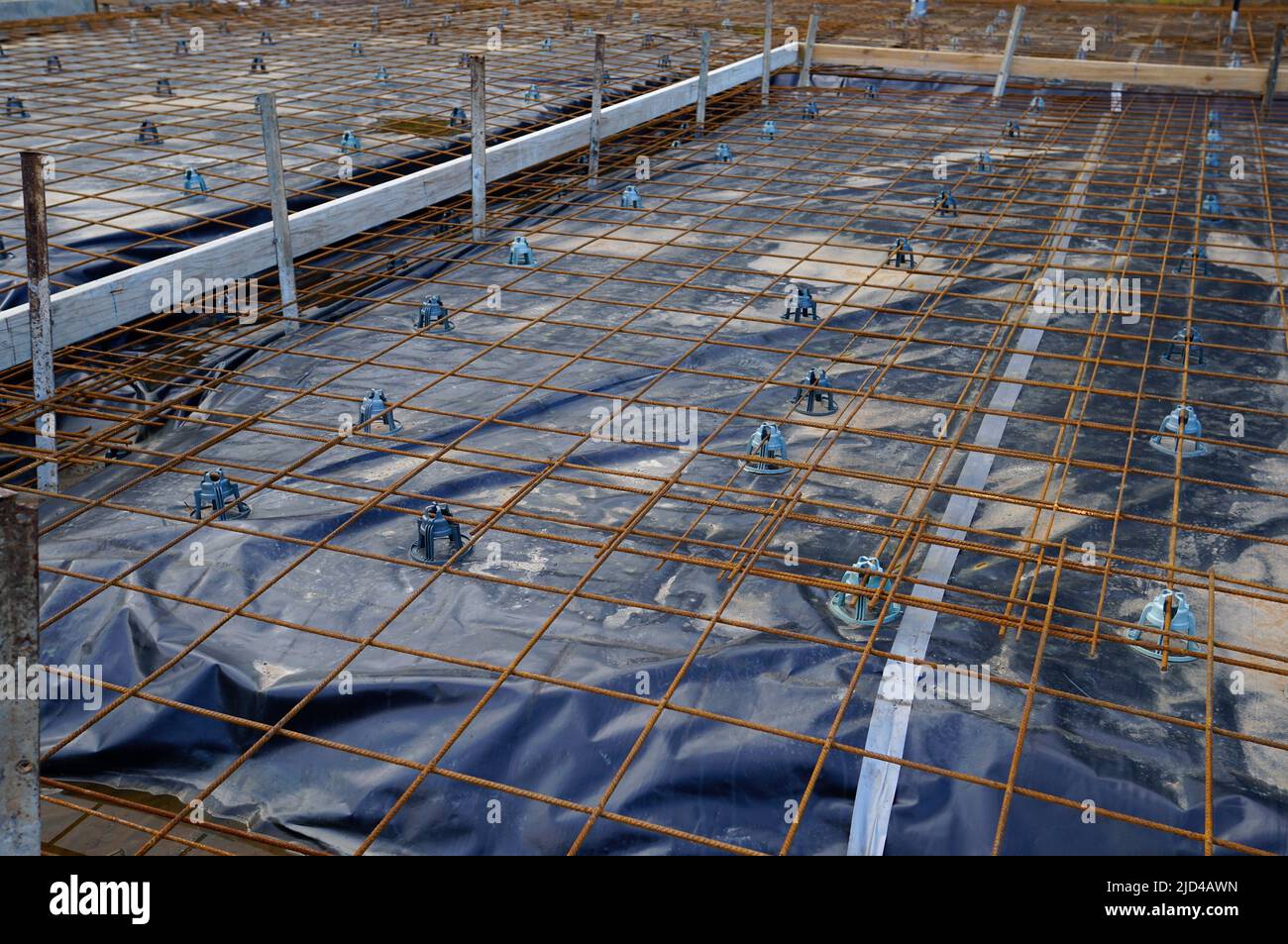 acciaio lavora pronto per versare calcestruzzo per costruire una nuova casa Foto Stock