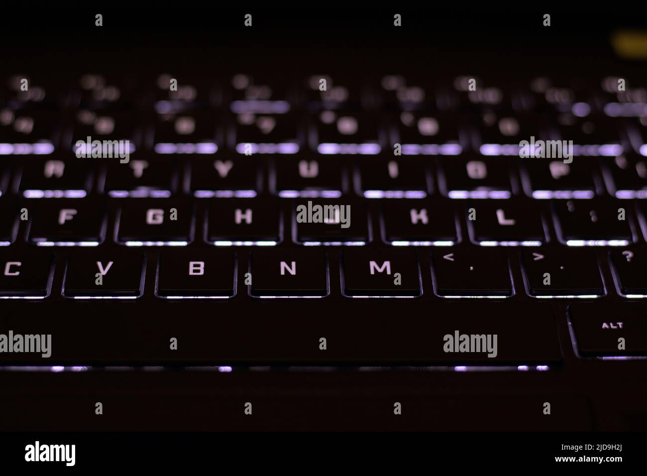 Tastiera del computer nera retroilluminata al buio Foto Stock
