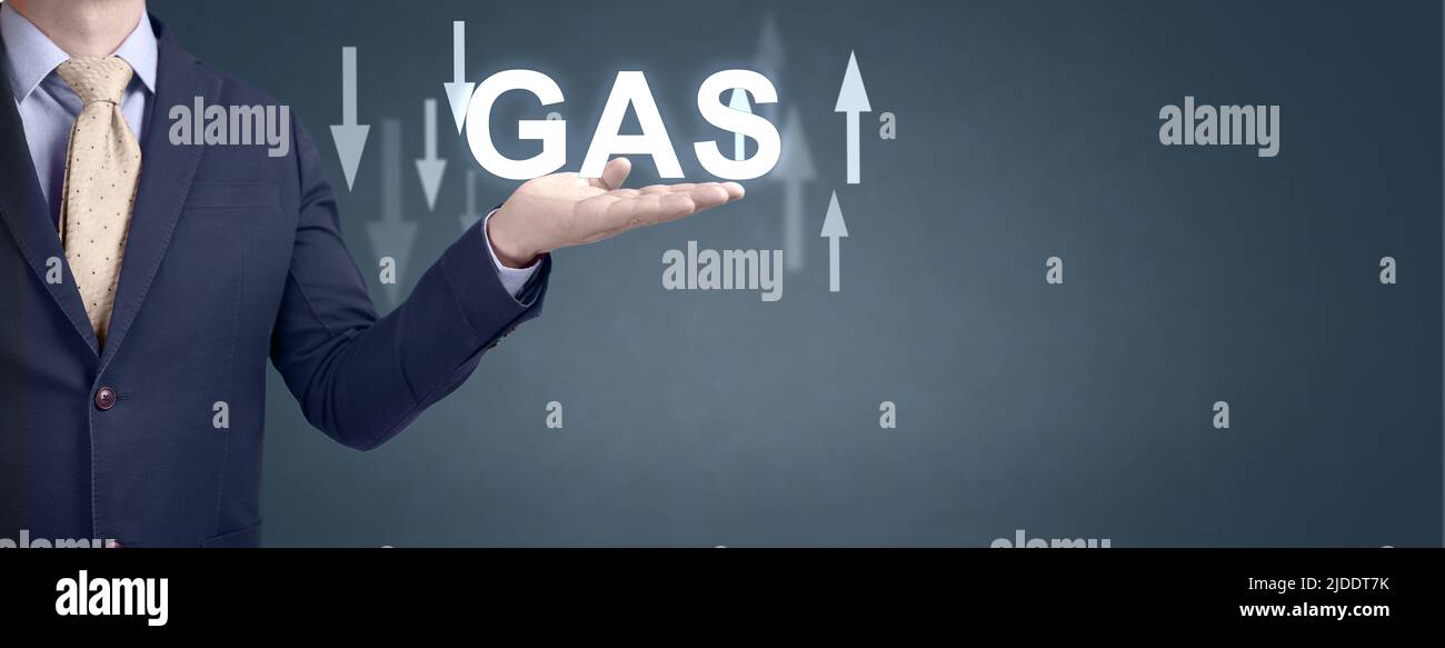 Andamento del gas. Prezzi del gas naturale. Crisi energetica con mercato azionario. Corrente cambiamento di prezzo. Costo di migliaia di metri cubi di gas. Uomo d'affari che mostra wor Foto Stock