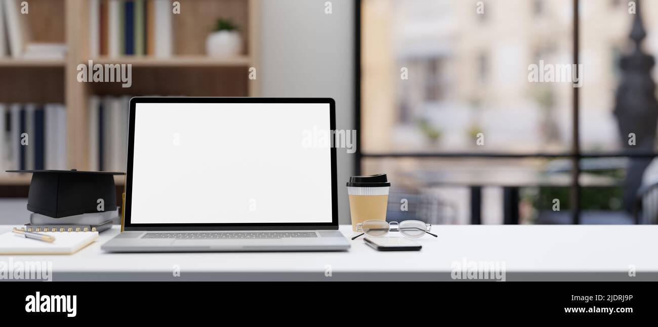Moderno tavolo da lavoro per ufficio con notebook portatile computer portatile con schermo bianco mockup, tabellone, occhiali, libro, tazza da caffè e roba. 3d giri Foto Stock