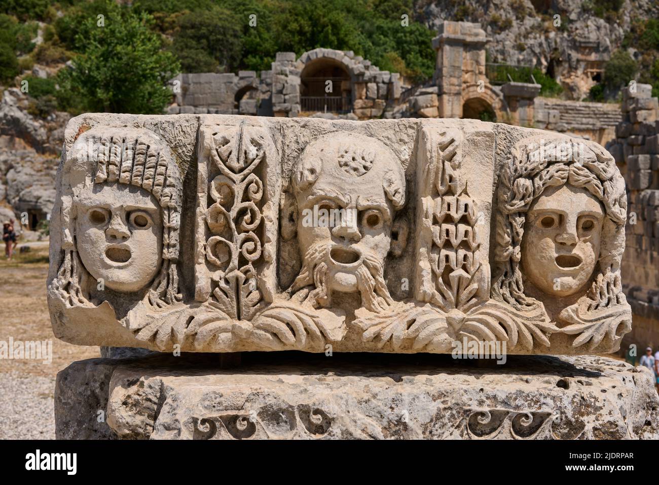 Facce di pietra nella città antica di Myra, Demre, Turchia Foto Stock