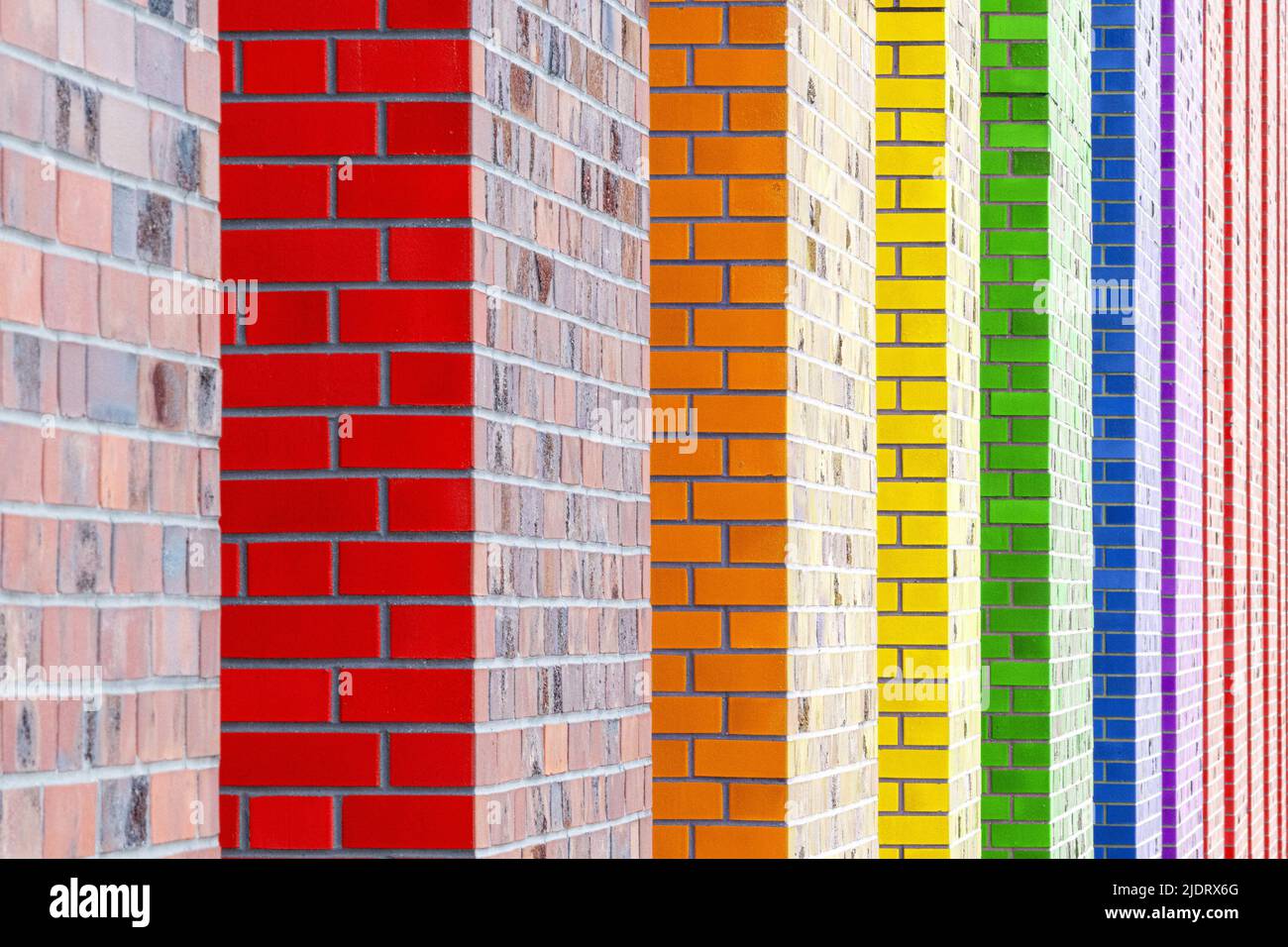 Muro colorato di mattoni con un sacco di profondità di campo Foto Stock